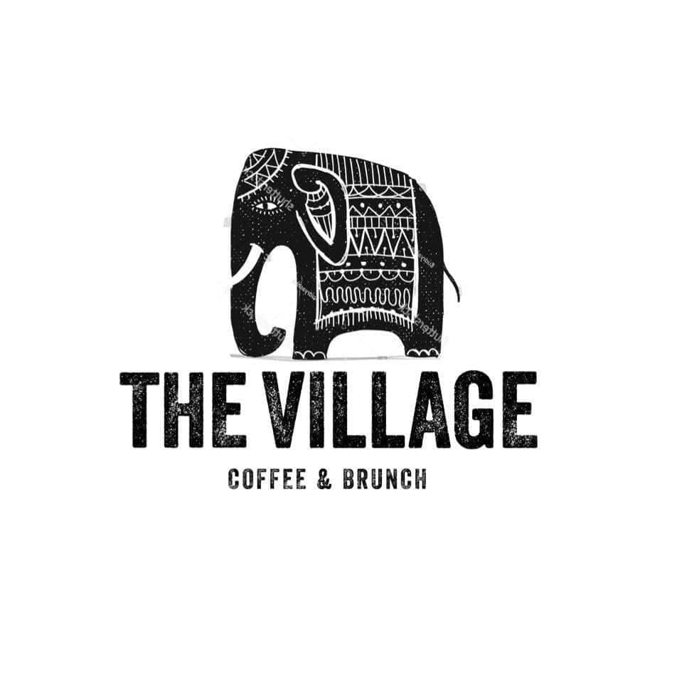 2022 logo: the patterned elephant above “THE VILLAGE / COFFEE & BRUNCH”